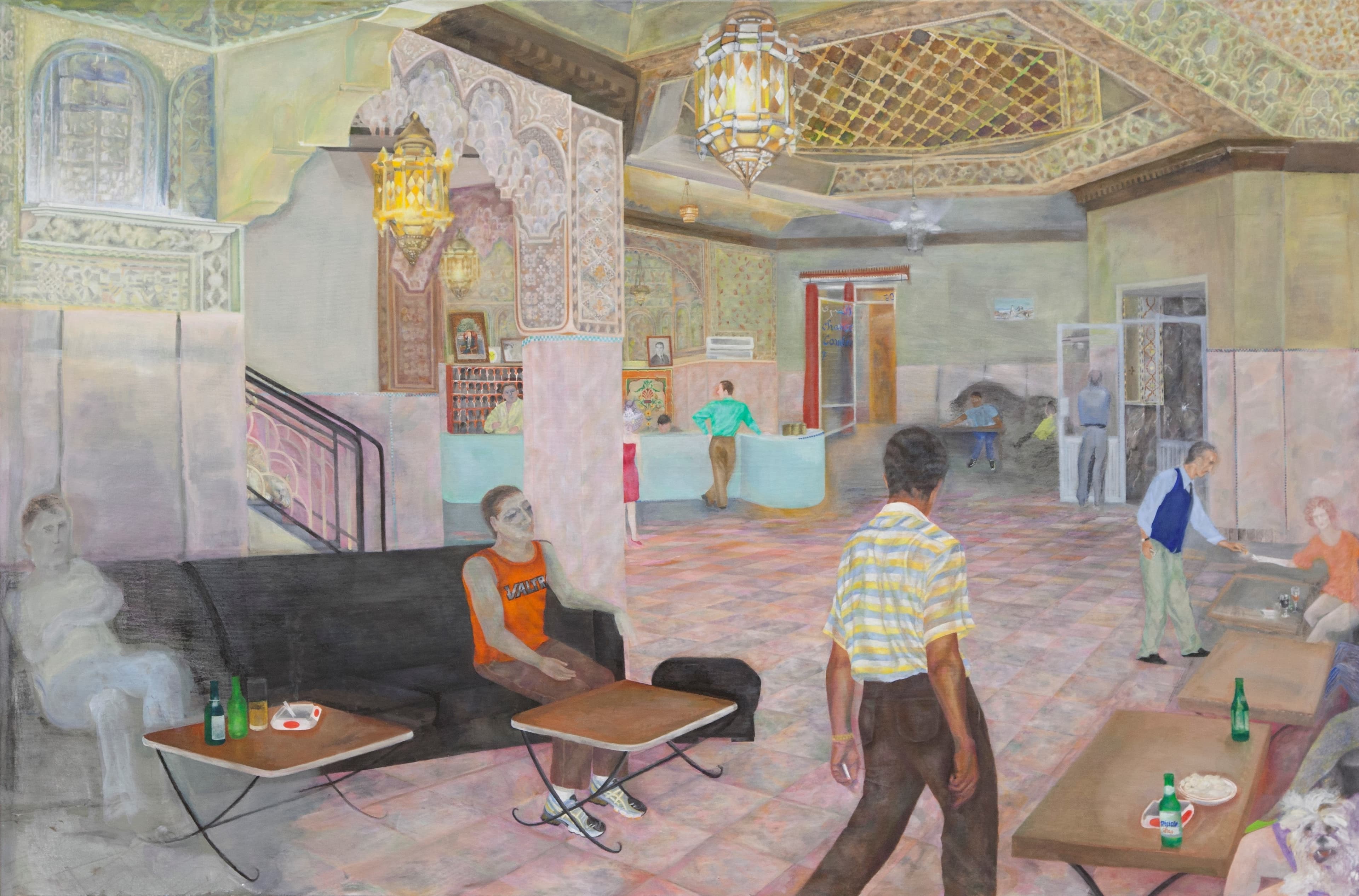 Lobby area of a hotel, several people sitting at tables or moving around the room