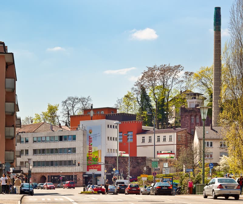 Several buildings, one with "Ketterer" inscription. A chimney is also present.